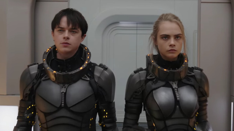 Valerian and Laureline stand in armored suits