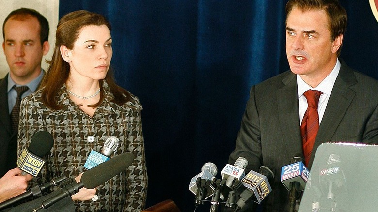 Julianna Margulies and Chris Noth addressing reporters