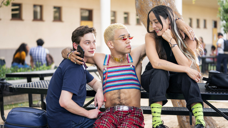 Cast of Generation sitting on picnic table