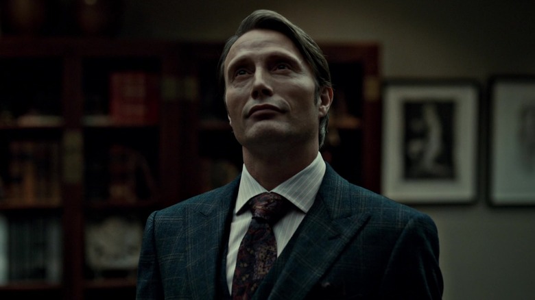 Hannibal sitting at dinner table