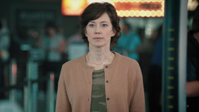 The Leftovers' Nora Durst standing in front of an airport metal detector