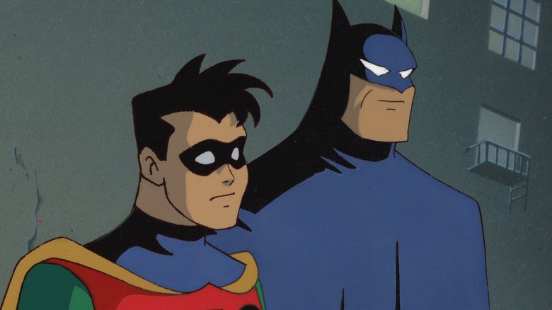 Batman and Robin staring