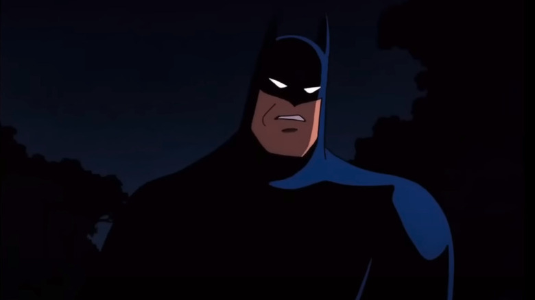 Batman tilts his head