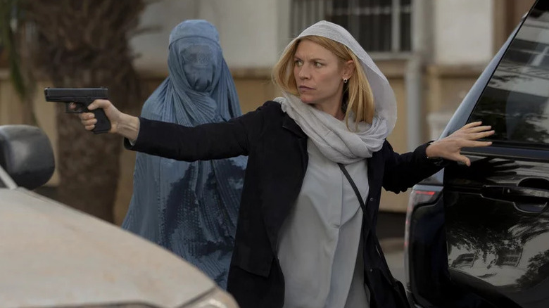 Claire Danes aims her gun