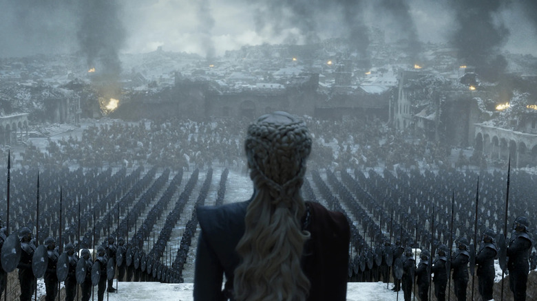 Evil Daenerys overlooks her army in a destroyed King's Landing.