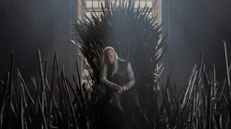 Daemon Targaryen on the Iron Throne.