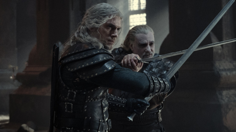 Geralt and Vesemir draw swords