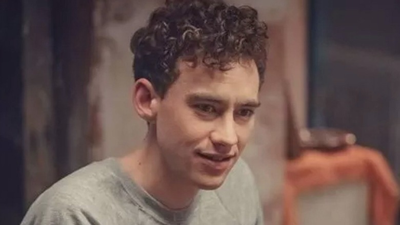 Olly Alexander smiles