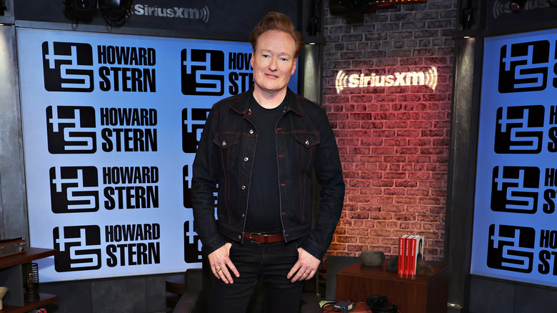 Conan O'Brien standing in a studio