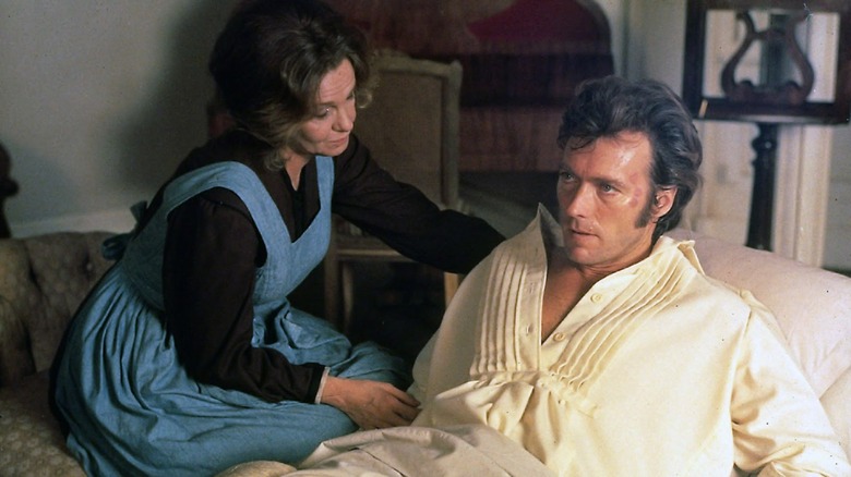 Corporal John 'McBee' McBurney being roused from bed by Martha Farnsworth in The Beguiled