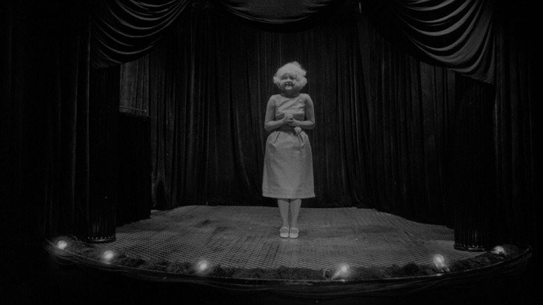 The Lady in the Radiator sings on stage in "Eraserhead" (1977)