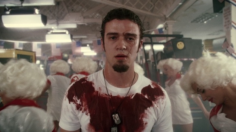 Blonde nurses dance around a blood-soaked Pilot Abilene in "Southland Tales" (2006)