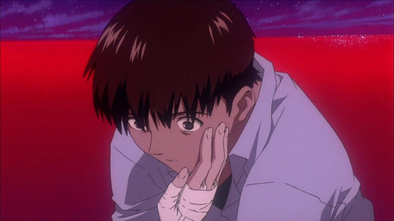 Asuka's bandaged hand touches Shinji in "The End of Evangelion" (1997)