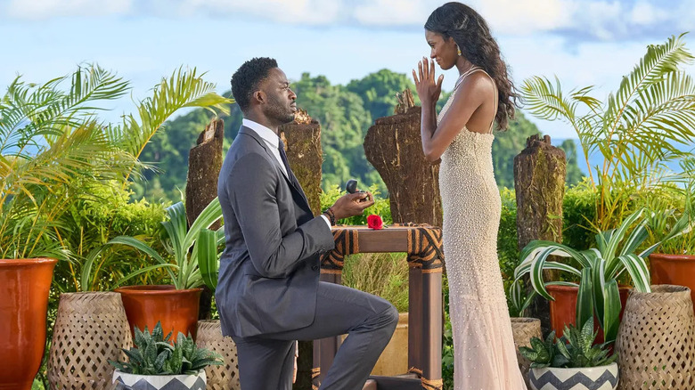 Contestant Dotun successfully proposing to Season 20 Bachelorette Charity Lawson