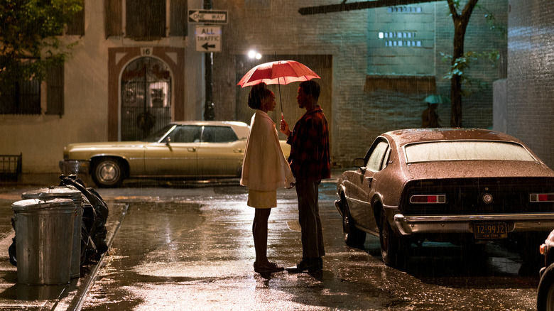 Tish and Fonny sharing an umbrella in If Beale Street Could Talk