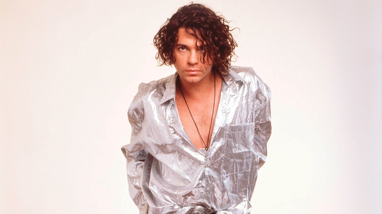 Michael Hutchence gazes intensely