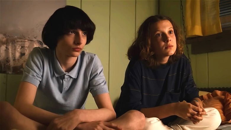 Mike Wheeler and Eleven looking serious