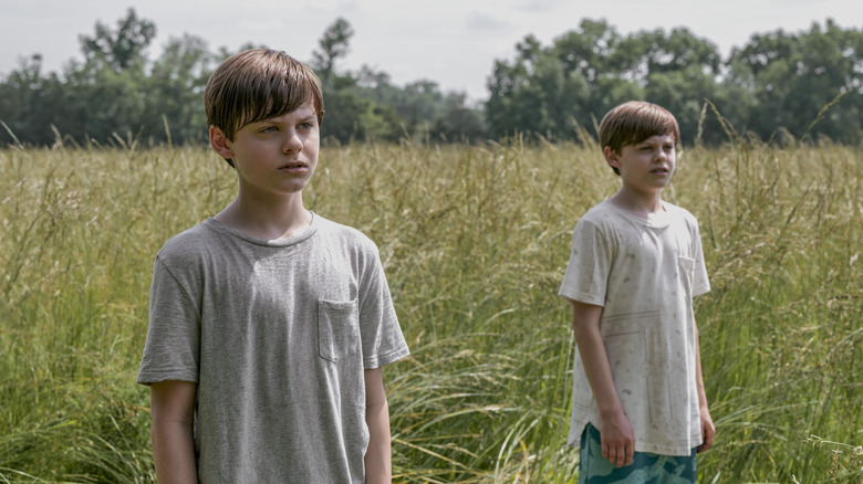 Elias and Lukas looking at the barn