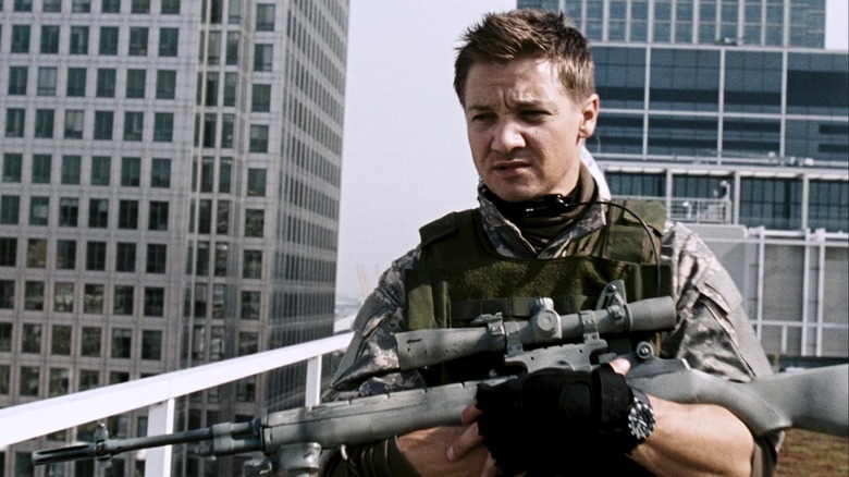 Jeremy Renner with sniper rifle