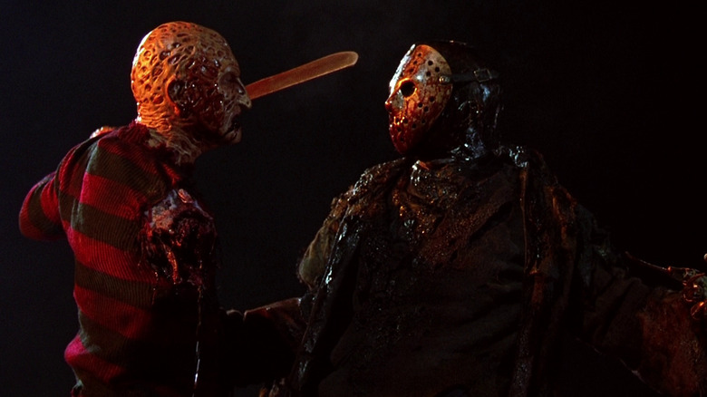 Freddy Krueger fighting Jason Voorhees