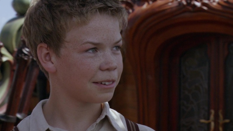 Will Poulter smiling