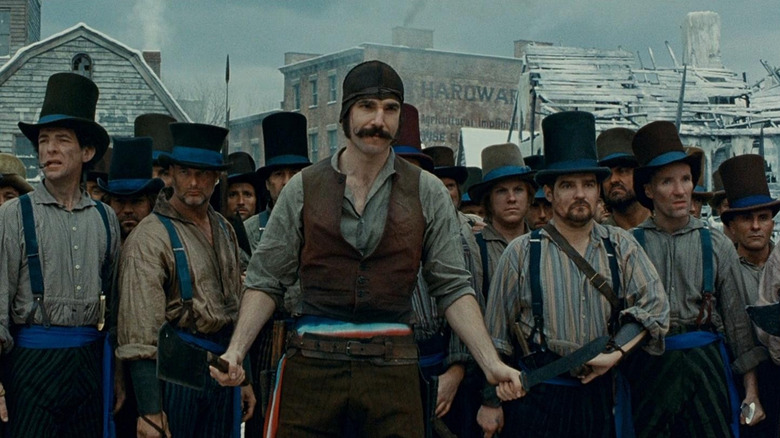 Bill the butcher leads a gang of thugs standing on a New York street in "Gangs of New York" (2002)