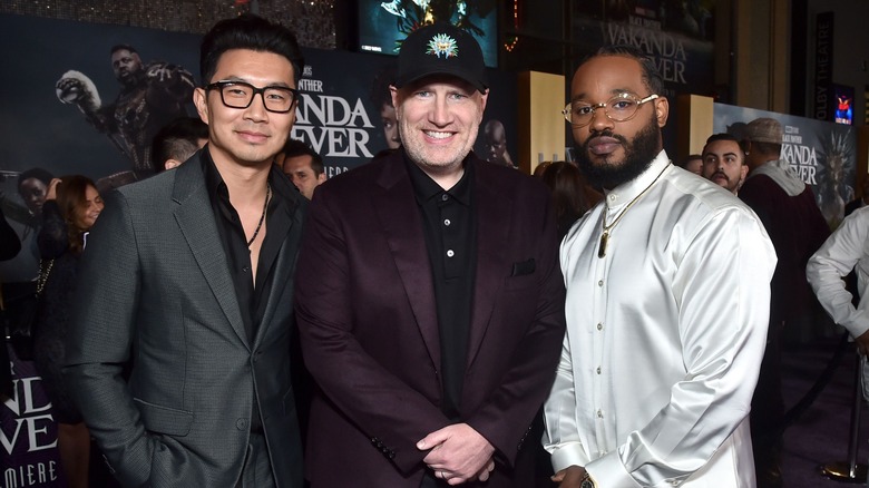 Feige, Liu, and Coogler smiling