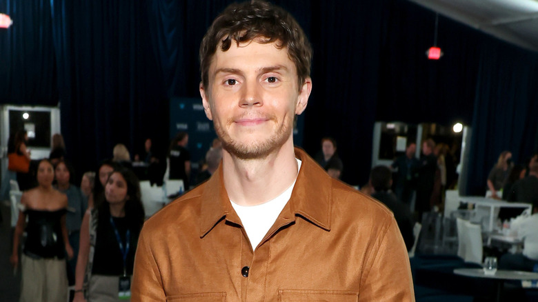 Evan Peters brown shirt