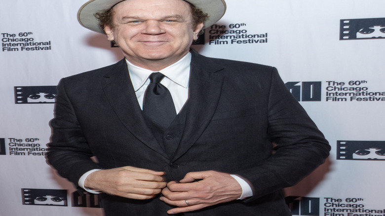 John C. Reilly smirking