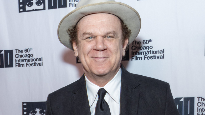 John C. Reilly smirking