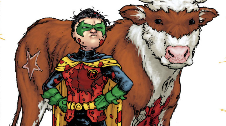 A blood-soaked Robin stands with Bat-Cow