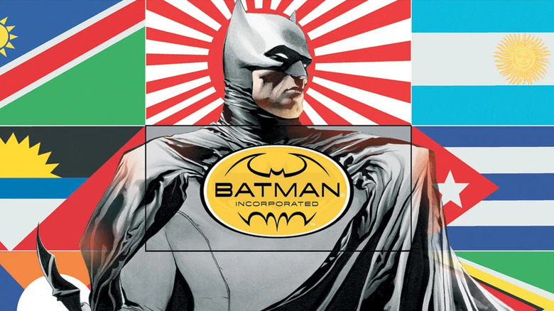 Batman standing in front of many flags