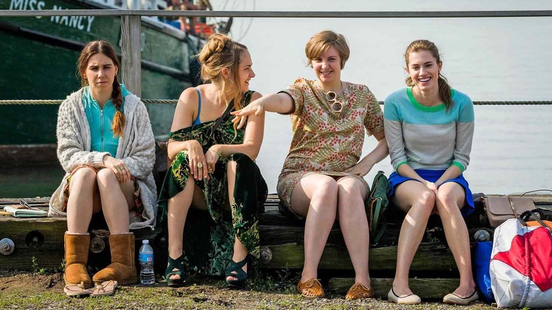 Shoshanna Jessa Hannah and Marnie sitting at a dock on Girls