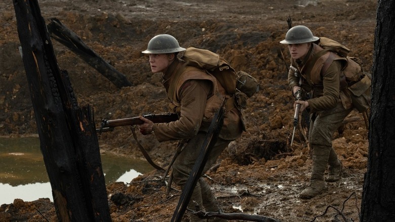 Schofield and Blake crouch with guns in no-mans land