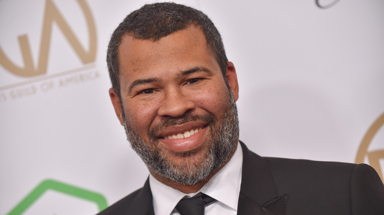 Jordan Peele grinning