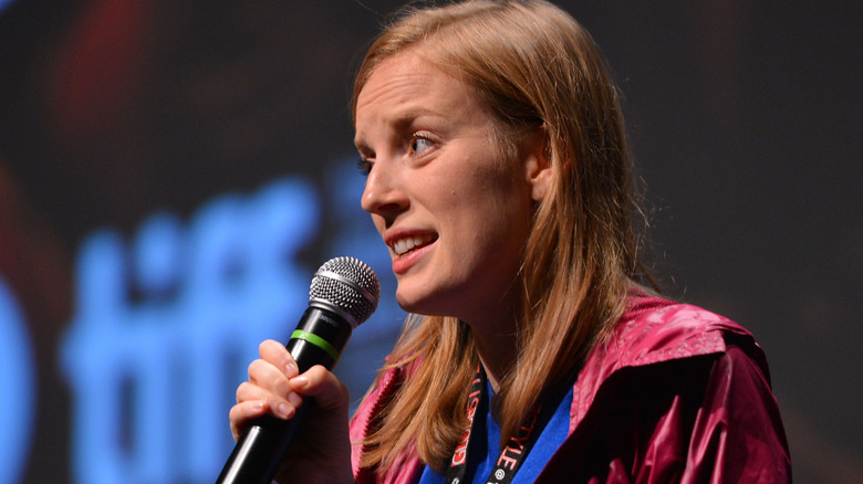 Sarah Polley with a microphone