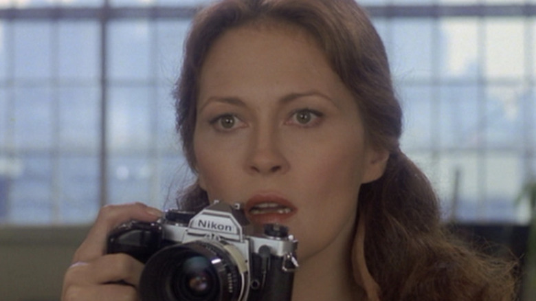 Shocked Faye Dunaway holds camera