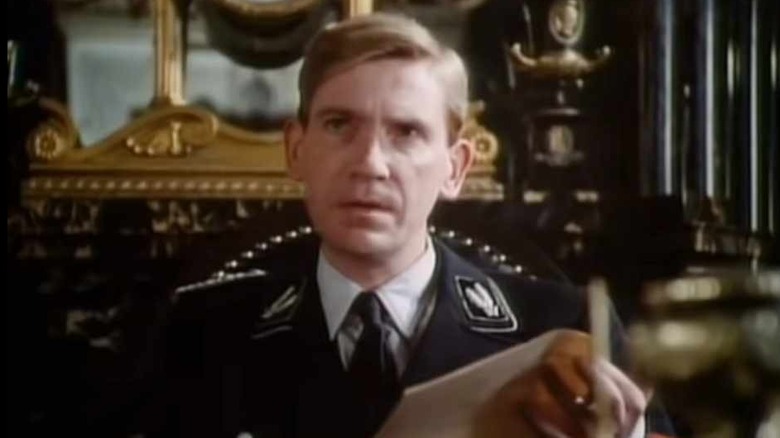 David Warner in a Nazi uniform