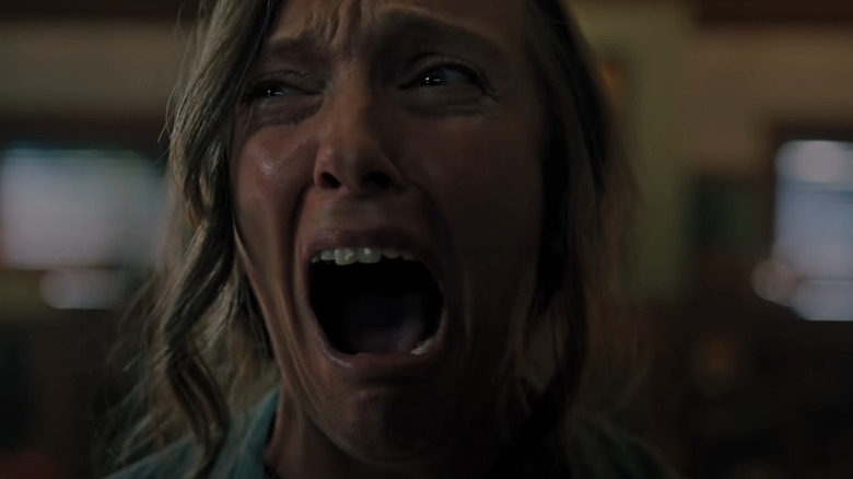 Toni Collette screams in terror in Hereditary