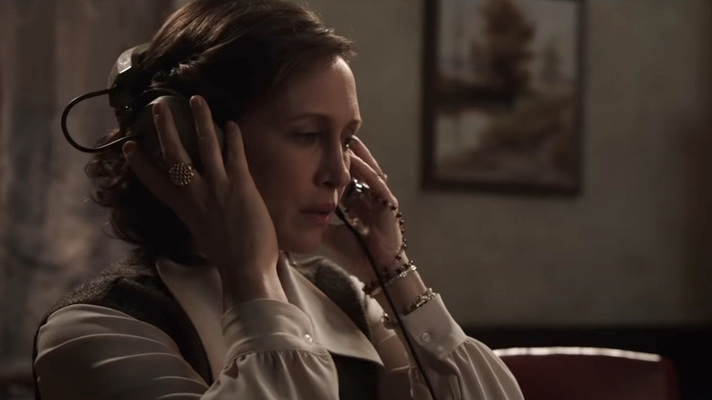 Vera Farmiga wears headphones in The Conjuring