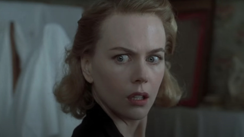 Nicole Kidman looking startled in The Others