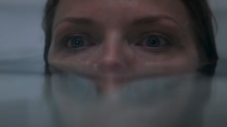 Michelle Pfeiffer partially submerged in water in What Lies Beneath