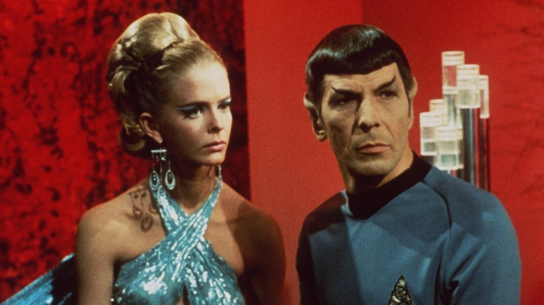 Spock standing near blonde woman 