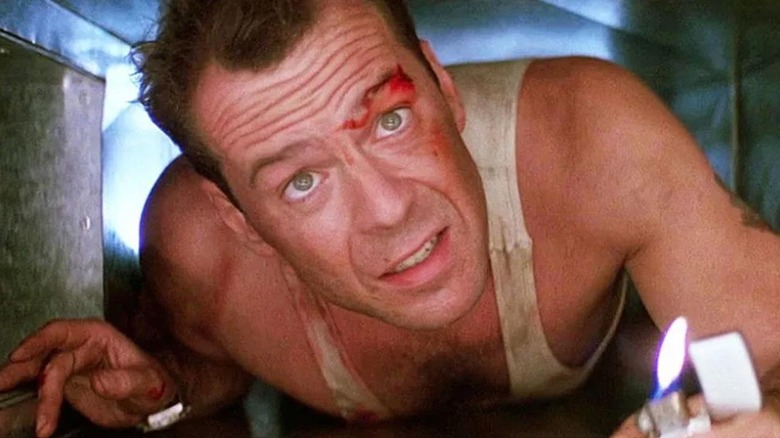 John McClane crawls through an air vent in "Die Hard" (1988)