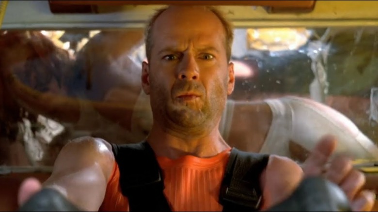 Leeloo drops into the back of Korben Dallas's cab in "The Fifth Element" (1997)