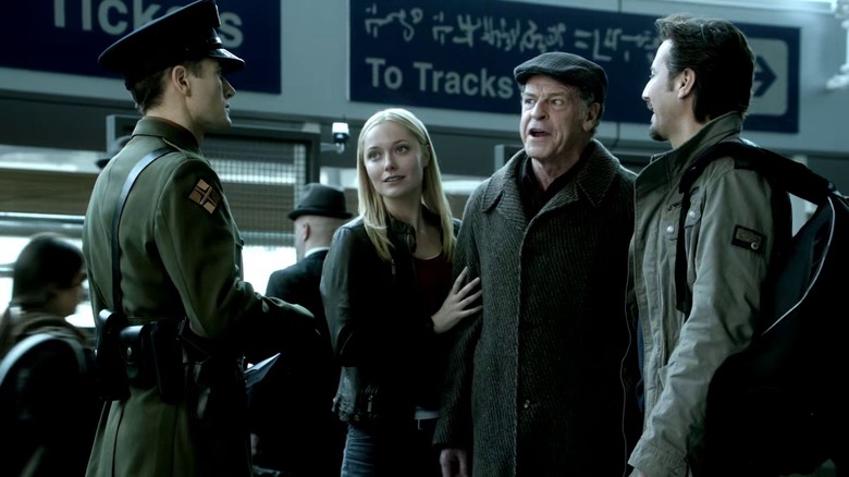 Etta with Walter and Simon at train station 