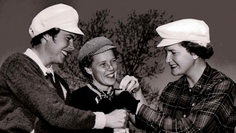 Several female golfers laughing