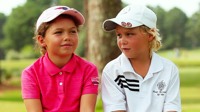 Young golfers talking