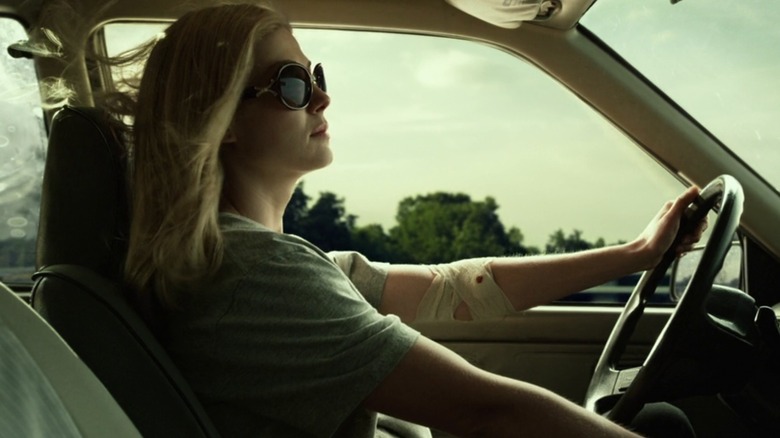 Amy driving a car