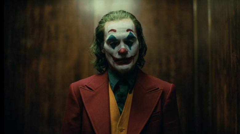 Joker dressed up in clown makeup